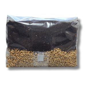Front view of Large Mushroom Grow Bag displaying the layered CVG substrate and grain, alongside the strategically placed injection port for easy access.